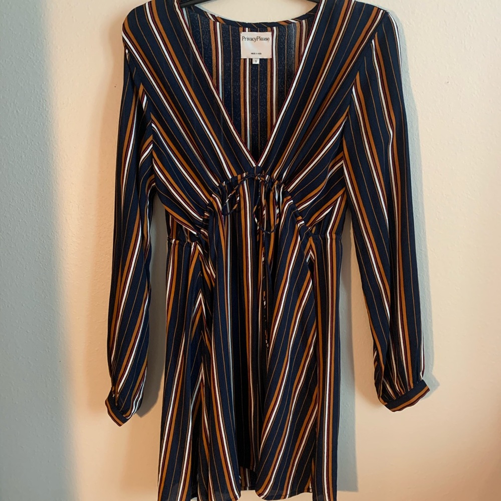 Long sleeved dress with pull string for neck line
